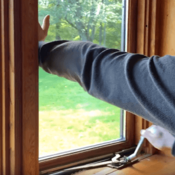 Image showing casement window being opened | OGS - Ontario Glazing Supplies